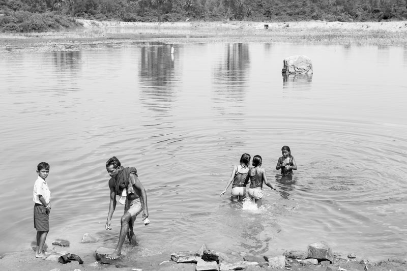 Wastewater Reuse: A village pond recharged with recycled mine wastewater in use by villagers for daily chores in Dhanbad district, Jharkhand